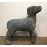 HAND SCULPTED LEAD FIGURE OF A DOG standing with a front paw slightly raised, length 50cm