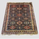 AFSHAR RUG South East Iran, circa 1920-30, the polychrome diamond lattice field containing