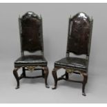 PAIR OF WALNUT AND LEATHER CHAIRS Spanish or Italian and possibly 17th century, the arched back