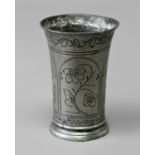 DUTCH PEWTER WRIGGLEWORK BEAKER probably circa 1700, of slightly flared form, with floral