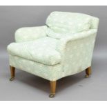 LENYGON & MORANT HOWARD STYLE ARMCHAIR green printed H&S fabric, the underside with a printed
