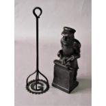 FOLK ART: Carved figure of a blacksmith, possibly Black Forest, standing at his anvil, height