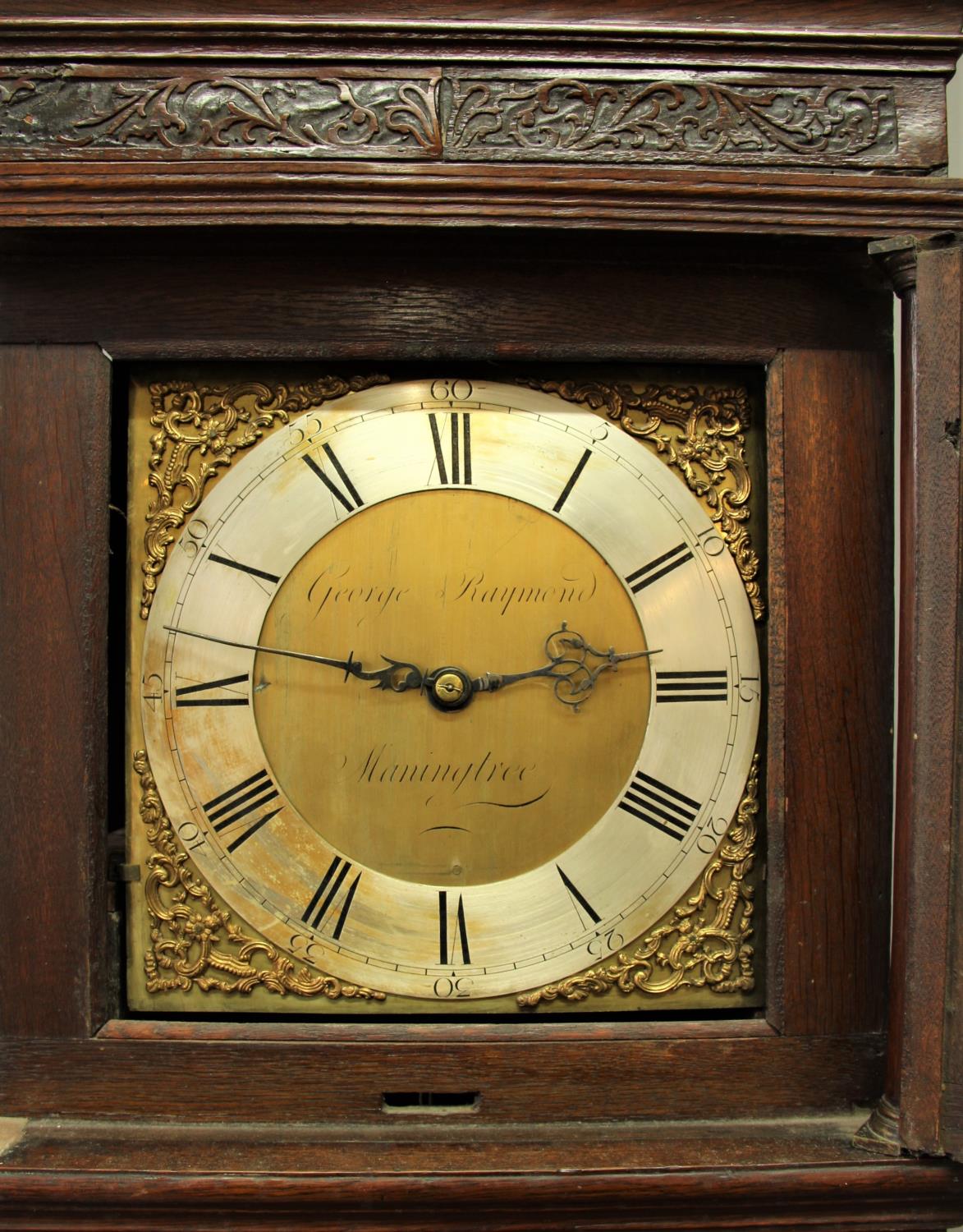 OAK LONGCASE CLOCK the brass dial with 11