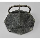17TH CENTURY BRONZE SUNDIAL of octagonal form, dated 1677 beneath an inscription and motto, with