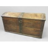 FRENCH OAK AND METAL MOUNTED DOMED TOP TRUNK 19th century, the front with cartouches carved with the