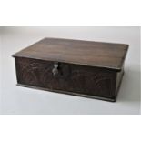 OAK BIBLE BOX dated 1739, with scrolling carved front panel, height 18cm, width 59cm, depth 42cm