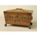 REGENCY MAHOGANY TEA CADDY of sarcophagus form, painted with ribbons and floral swags on ball and