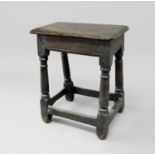 CAROLEAN OAK JOINT STOOL the rectangular seat on turned legs and a box stretcher, height 53cm,