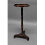 GEORGIAN MAHOGANY KETTLE STAND the shaped rectangular tray top on a reeded and turned, slight