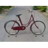 A Gladiator Sprung-Frame Lady's Bicycle. Currently finished in red enamel with nickel-plated