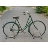 A Lady's Loop Frame Bicycle. Nicely restored with green enamel and nickel-plated parts, this machine