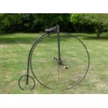 A 54-inch Starley & Sutton (?) Ordinary Bicycle. Having 26-inch hooped handlebars with turned bone