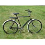 A Rudge-Whitworth Bicycle with a 23-inch black painted frame, Bluemel mudguards, up-turned 19-inch