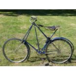 A circa 1909 Dursley Pedersen Bicycle. Painted blue with nickel-plated front and rear forks, it is a