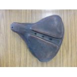 Leather Saddle by Ideale, a padded saddle with a tension frame and mounting bars.