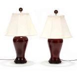 A Matched Pair of Chinese Sang de Boeuf Lamps