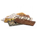 Seven Vintage License Plates