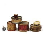 Grouping of Seven Small Drums