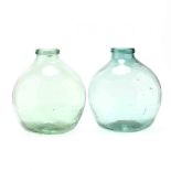 Two Large Green Glass Demijohn Bottles