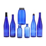Group of Seven Cobalt Glass Containers