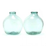 Two Large Green Glass Demijohn Bottles