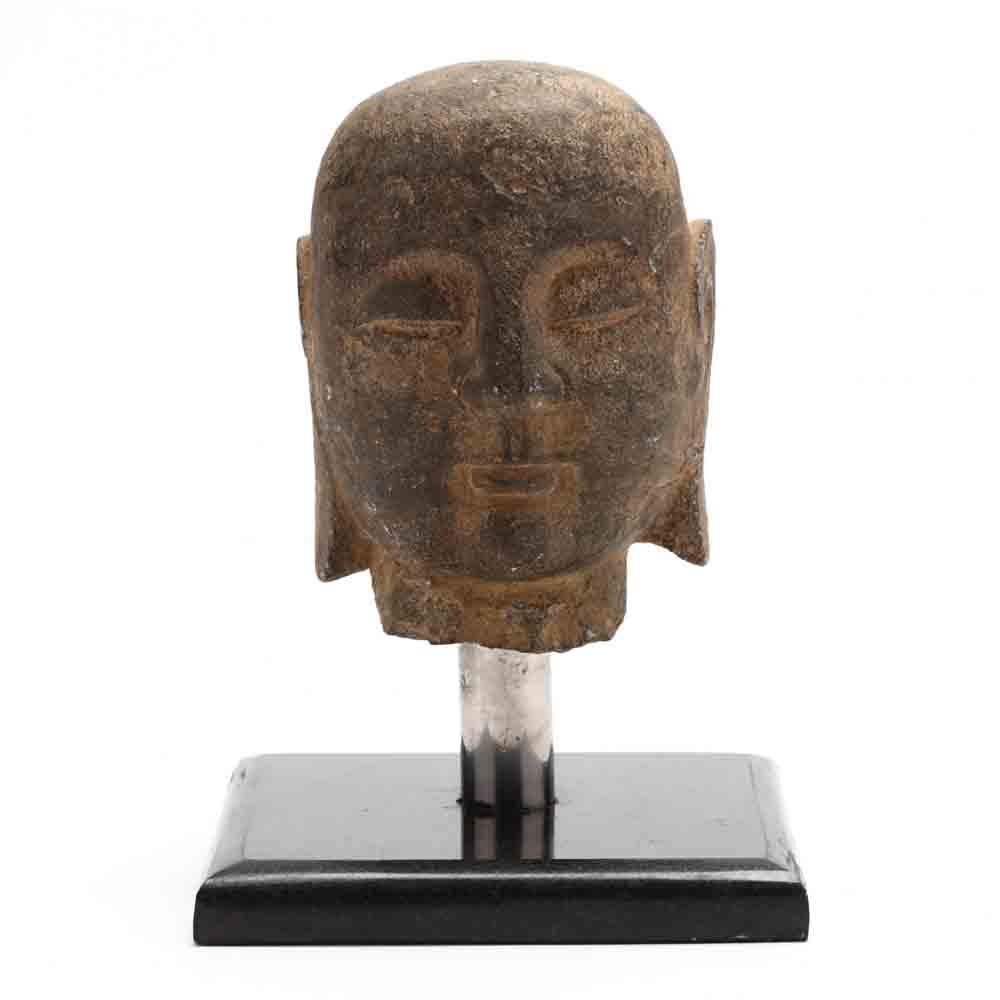 A Carved Stone Buddha Head