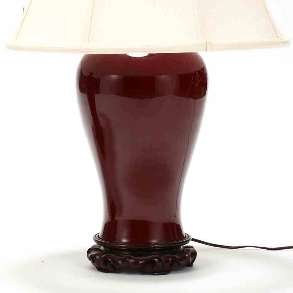 A Matched Pair of Chinese Sang de Boeuf Lamps - Image 3 of 4