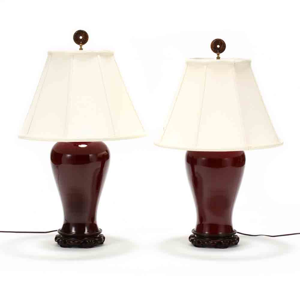 A Matched Pair of Chinese Sang de Boeuf Lamps