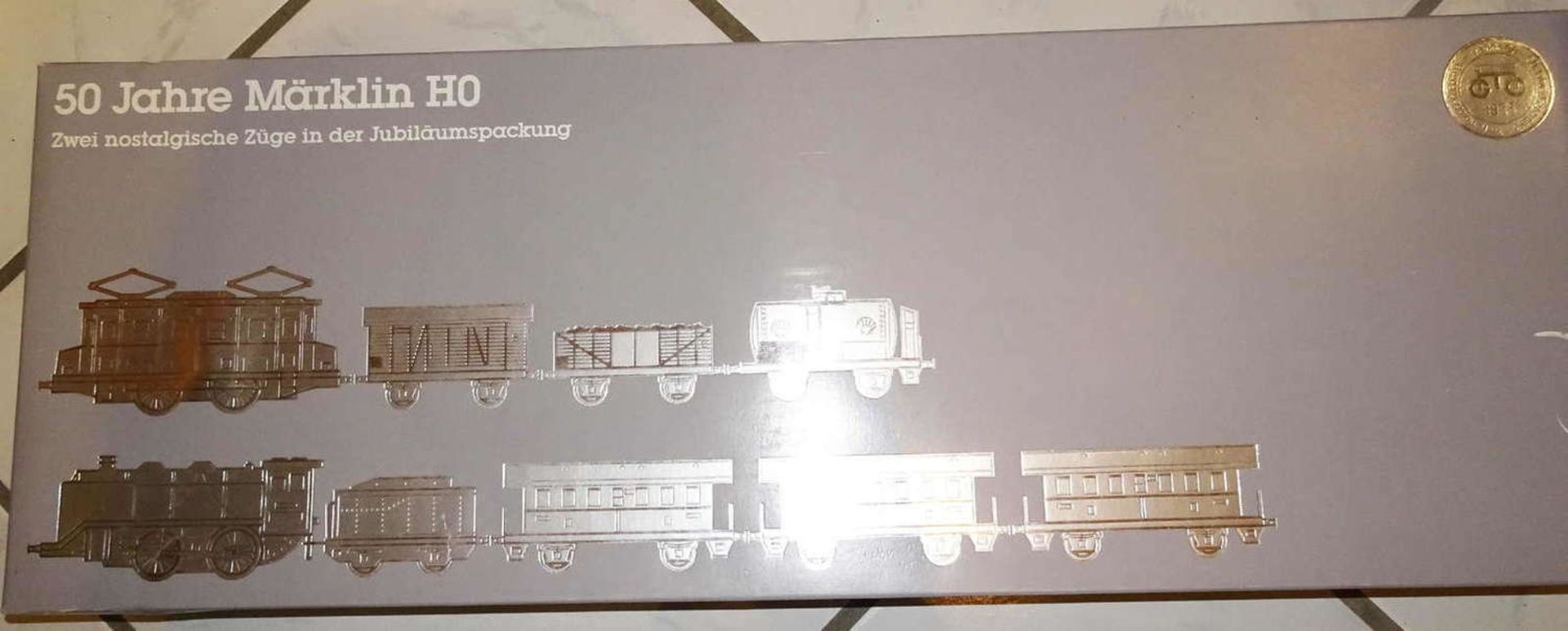 Märklin special edition "50 Years Märklin HO", 2 trains, train set No. 0050, unused condition.