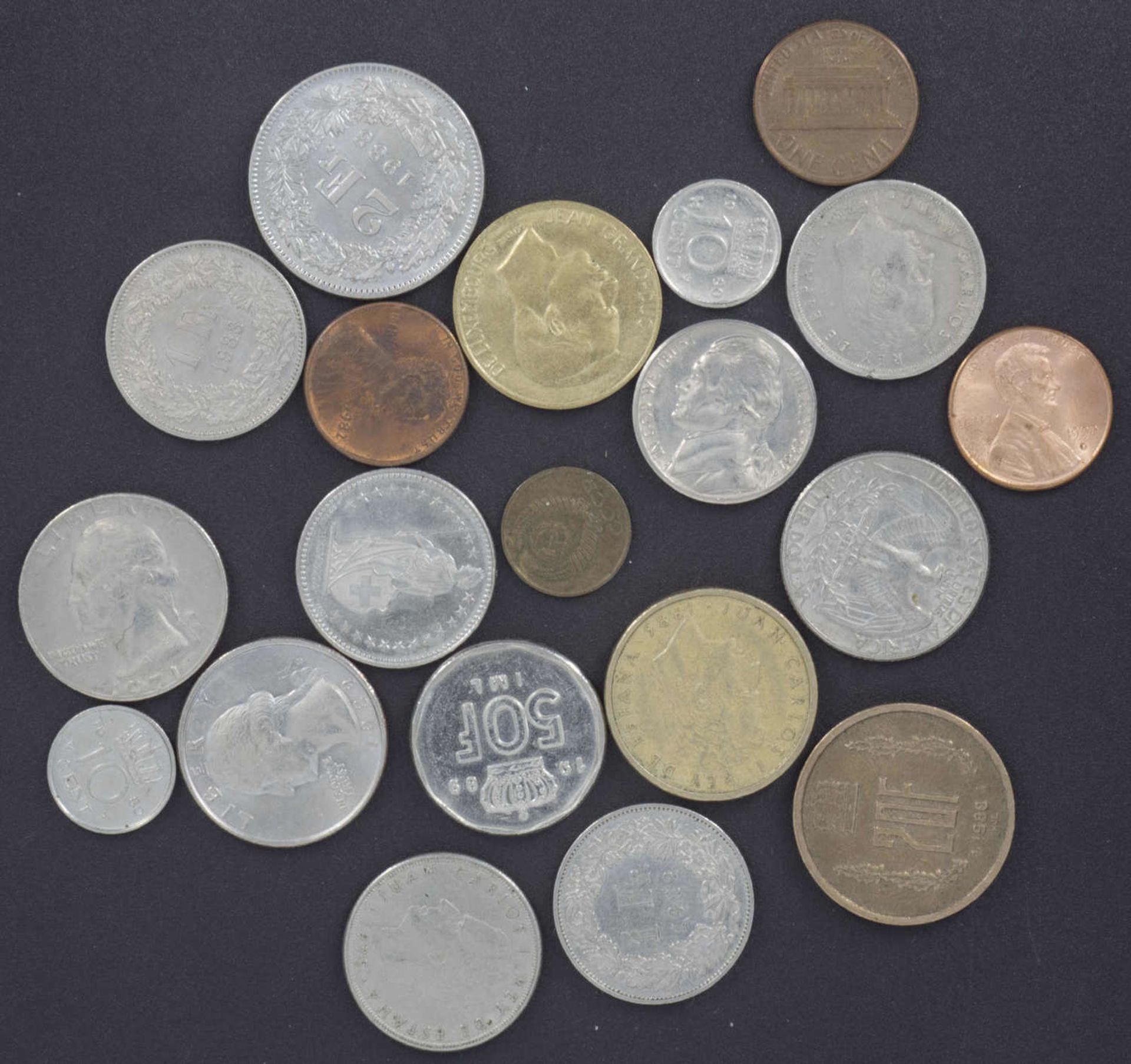 Lot of coins from USA, Switzerland and Spain. Please visit.