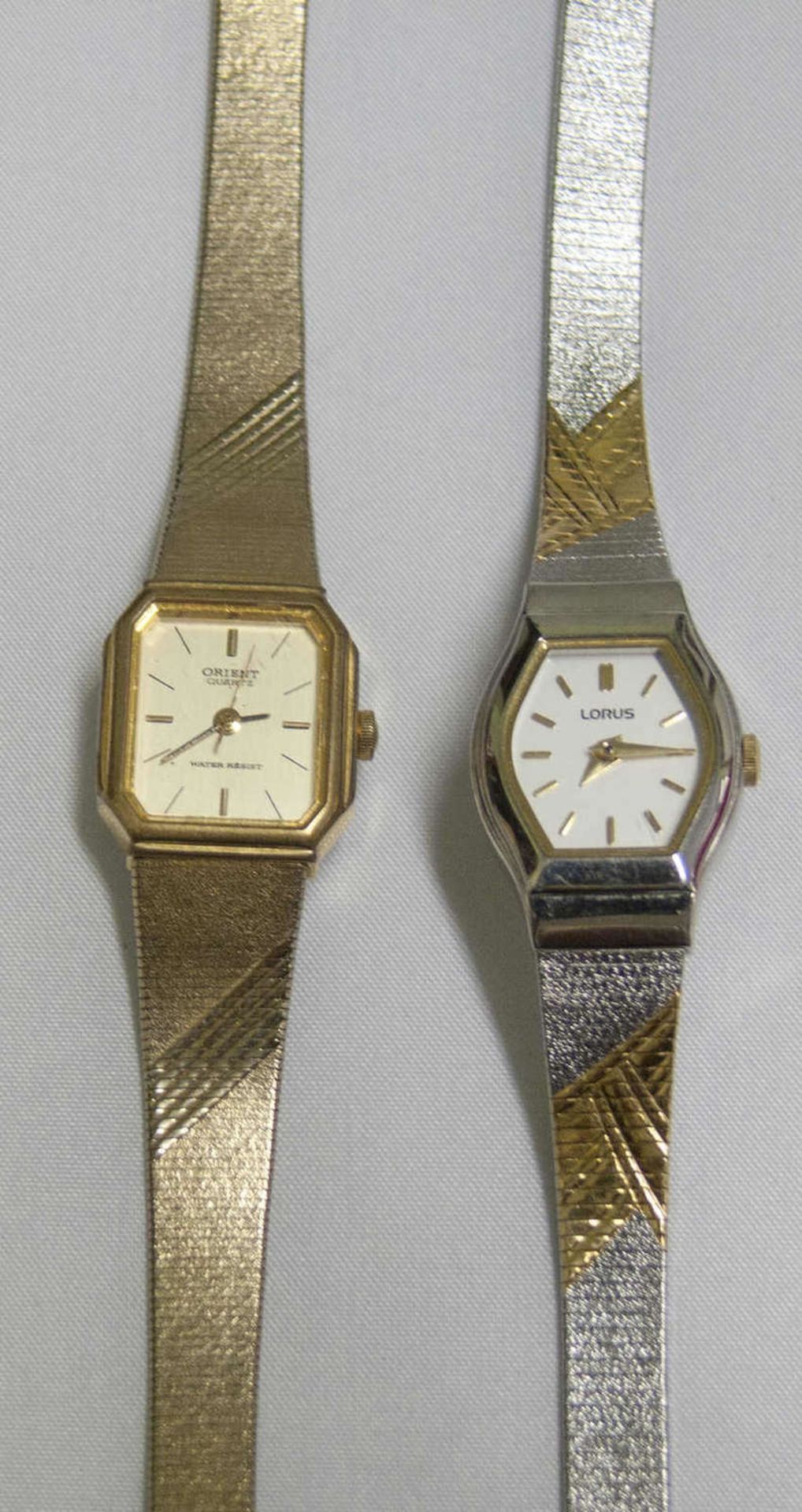 2 ladies wristwatches quartz, metal. Used.