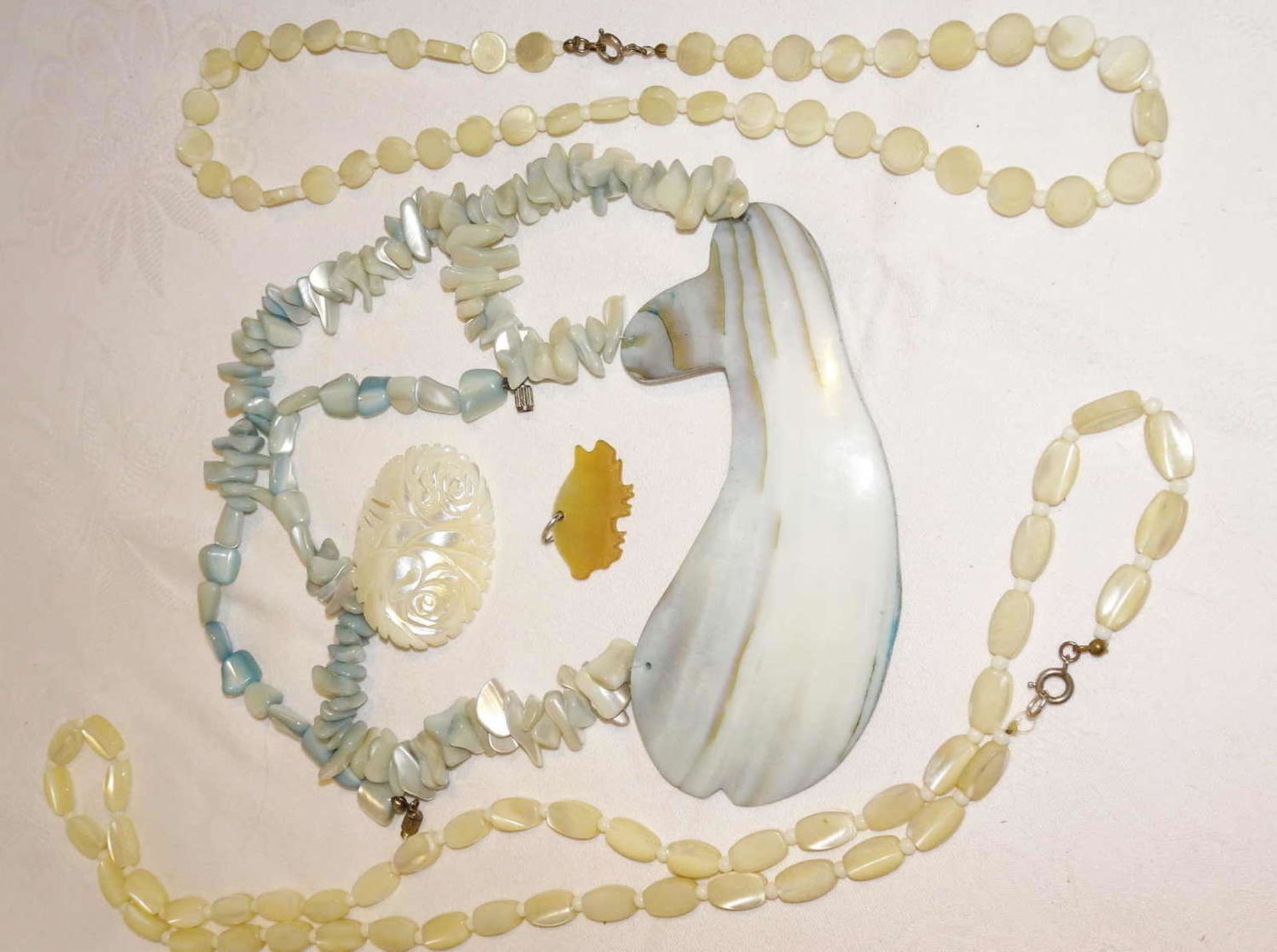 Lot mother-of-pearl jewelry, including chains, brooch, pendant