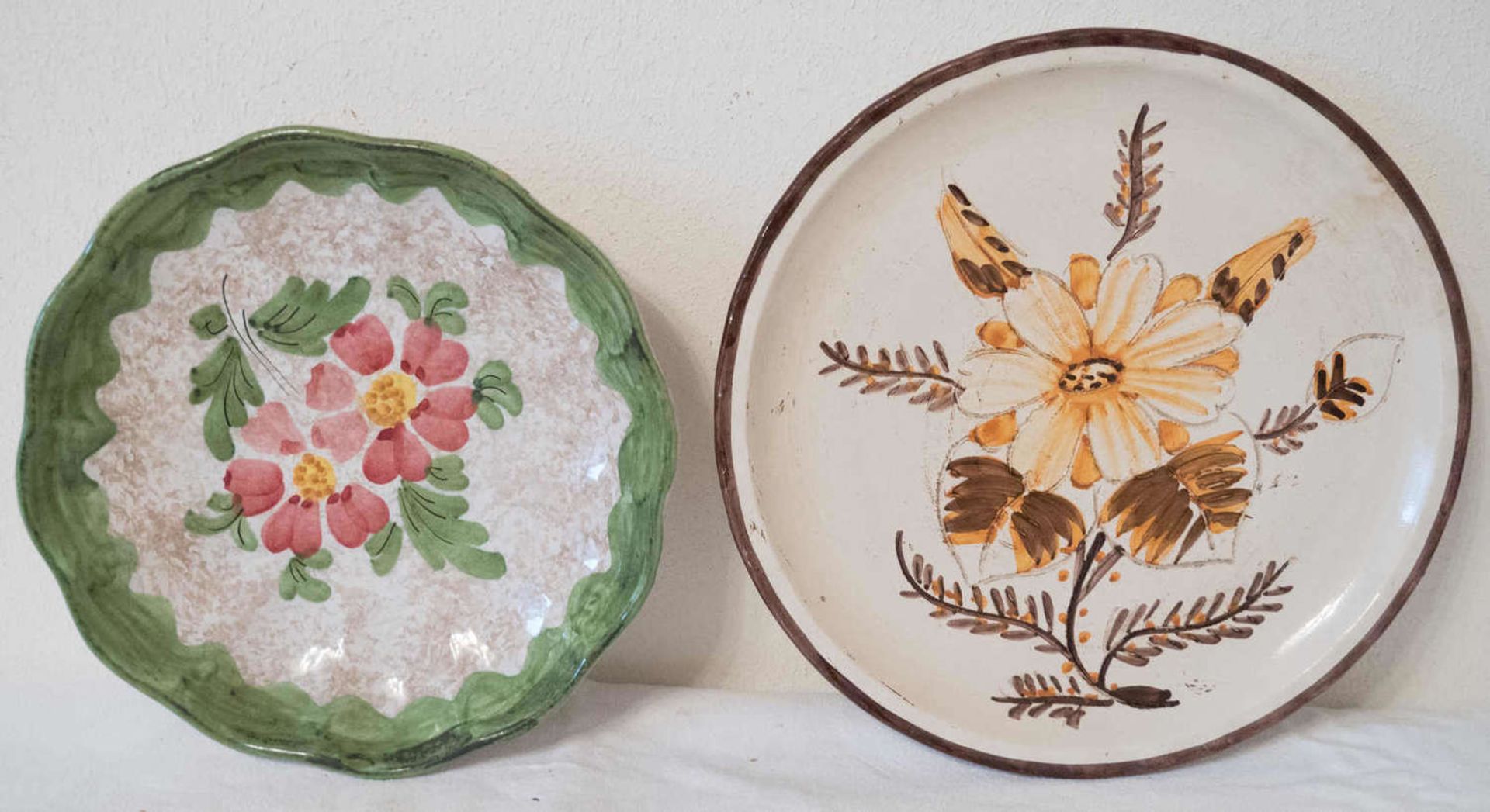 Two ceramic wall plates. Please visit.