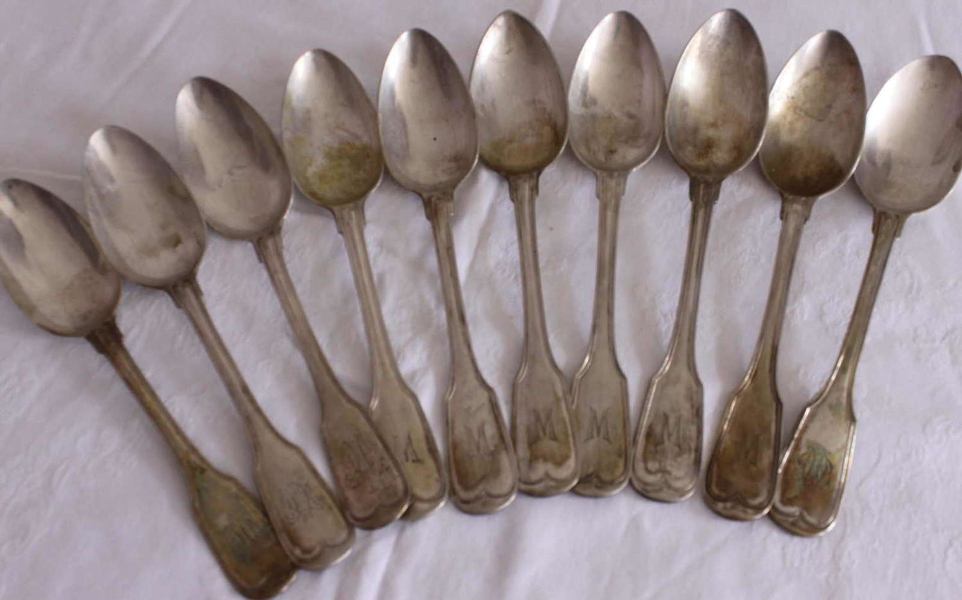 10 soup spoons, 800 silver, same series. With the monogram "M". Total weight about 700 gr