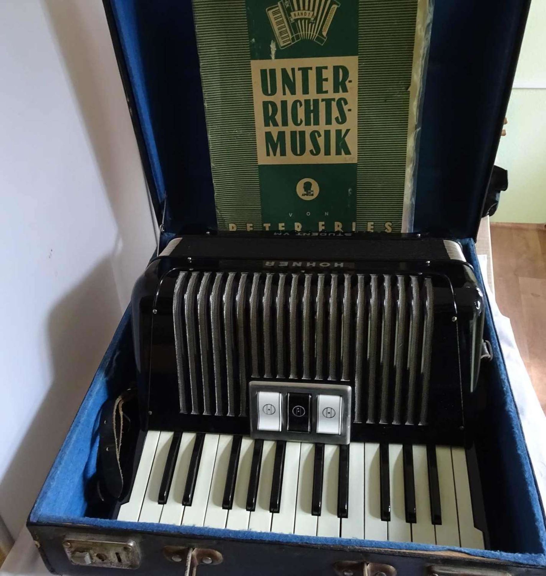 Hohner accordion student VM in a case.