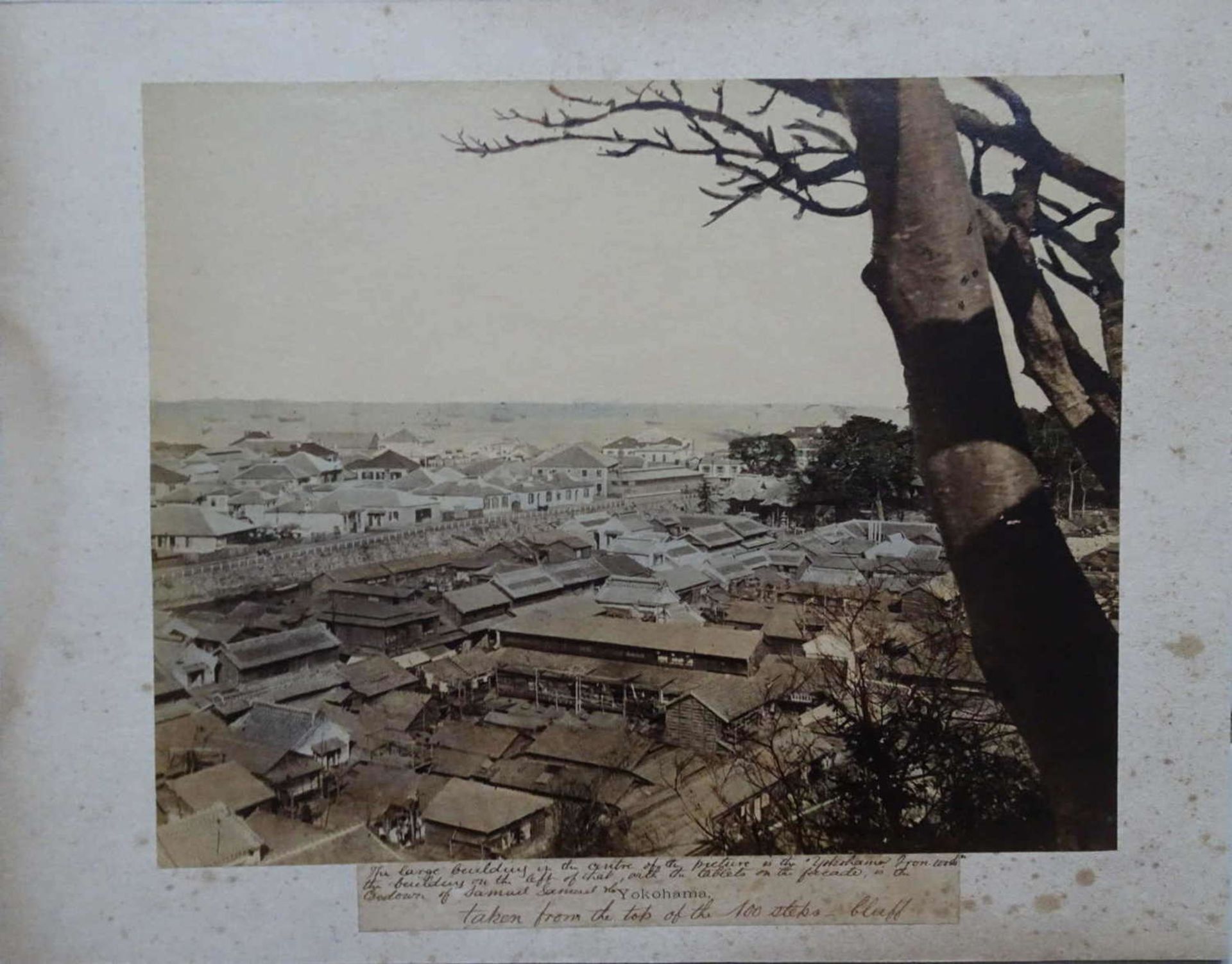 2 historical photographs, 1x view of Yokohama, including handwritten explanation, and 1 standing