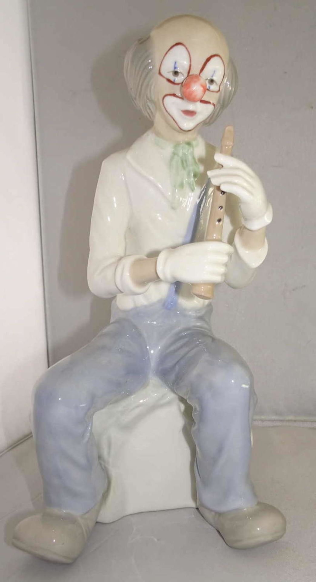 Porcelain figurine Tengra, hand made in Spain, Valencia. Clown with flute in hand. Marked with