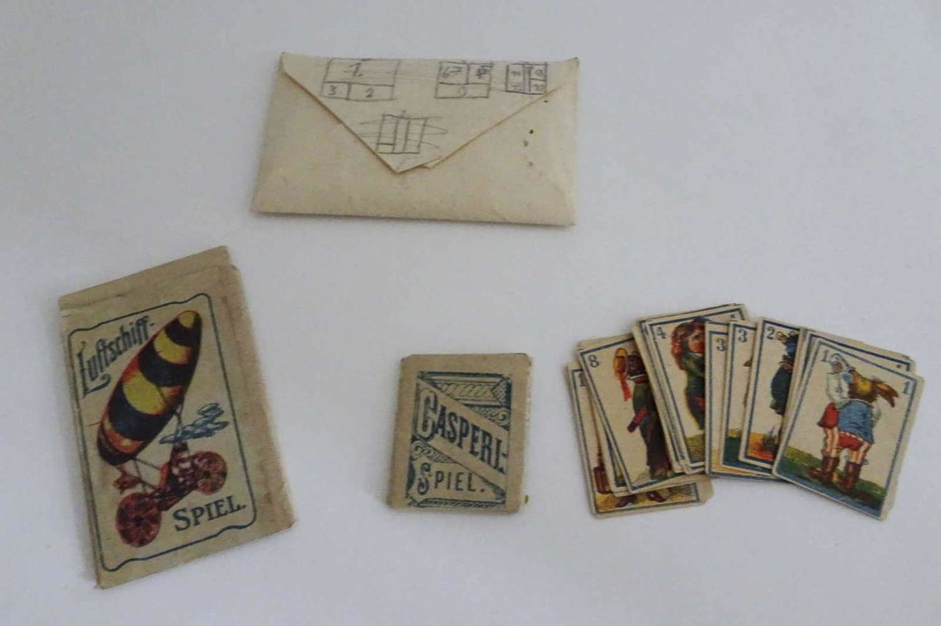 Envelope with game cards in mini format, 1x "Airship game", 1 x "Casperl game", and a small card - Bild 2 aus 2