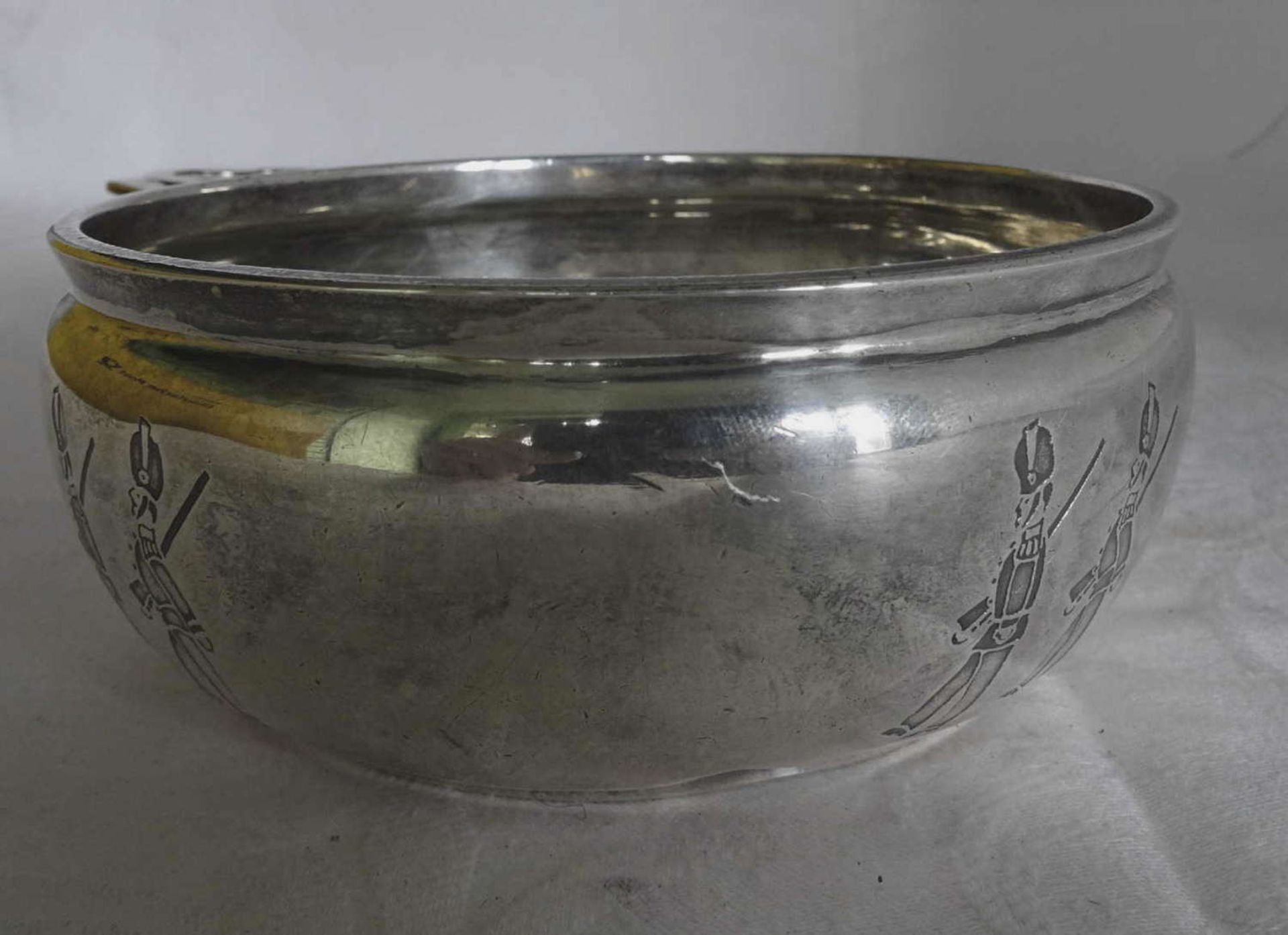 Silver bowl with handle, sterling silver. With engraved soldiers marching. Engraved on the inside "