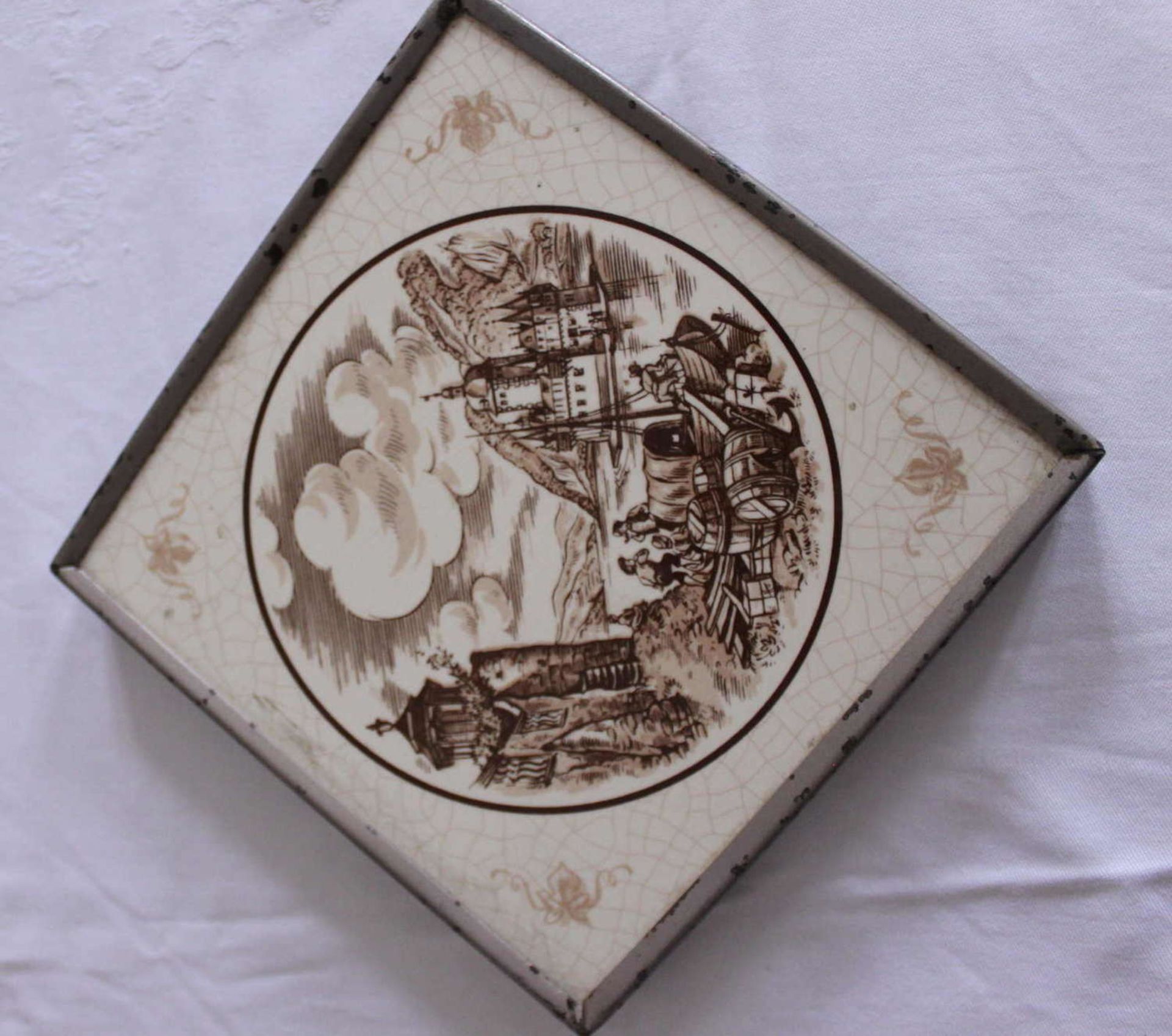 Tile Grünstadt ceramics in metal fittings, motif peasants on the river. Partly chip. 15x15 cm<
