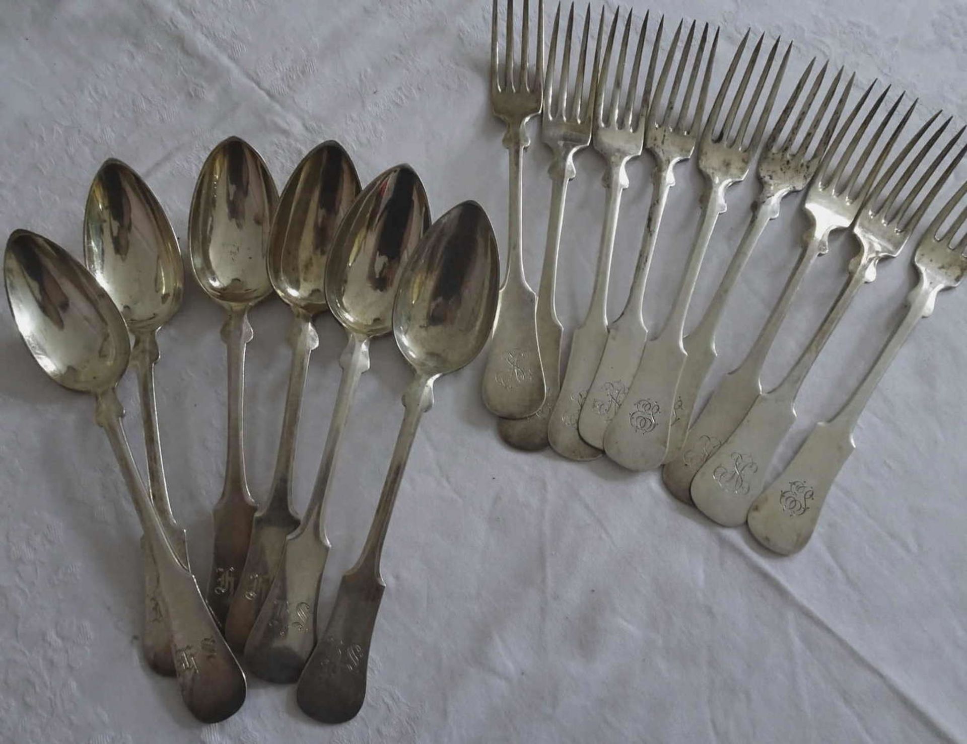 Cutlery pieces, 800 silver, hallmarked with F. Zutter. Same series, a total of 9 forks and 6 soup