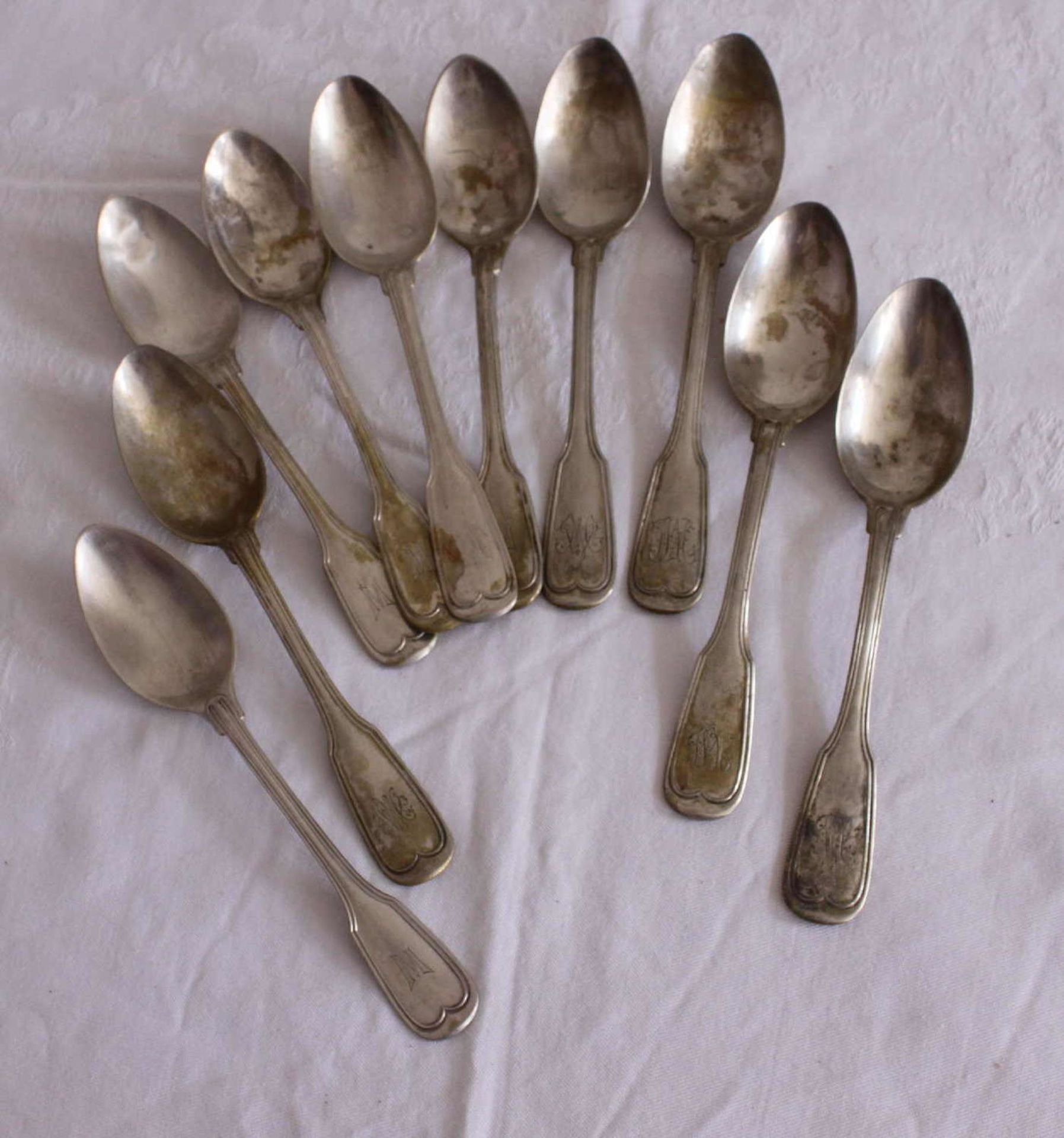 10 coffee spoons, 800 silver, with monogram. Total weight about 200 gr