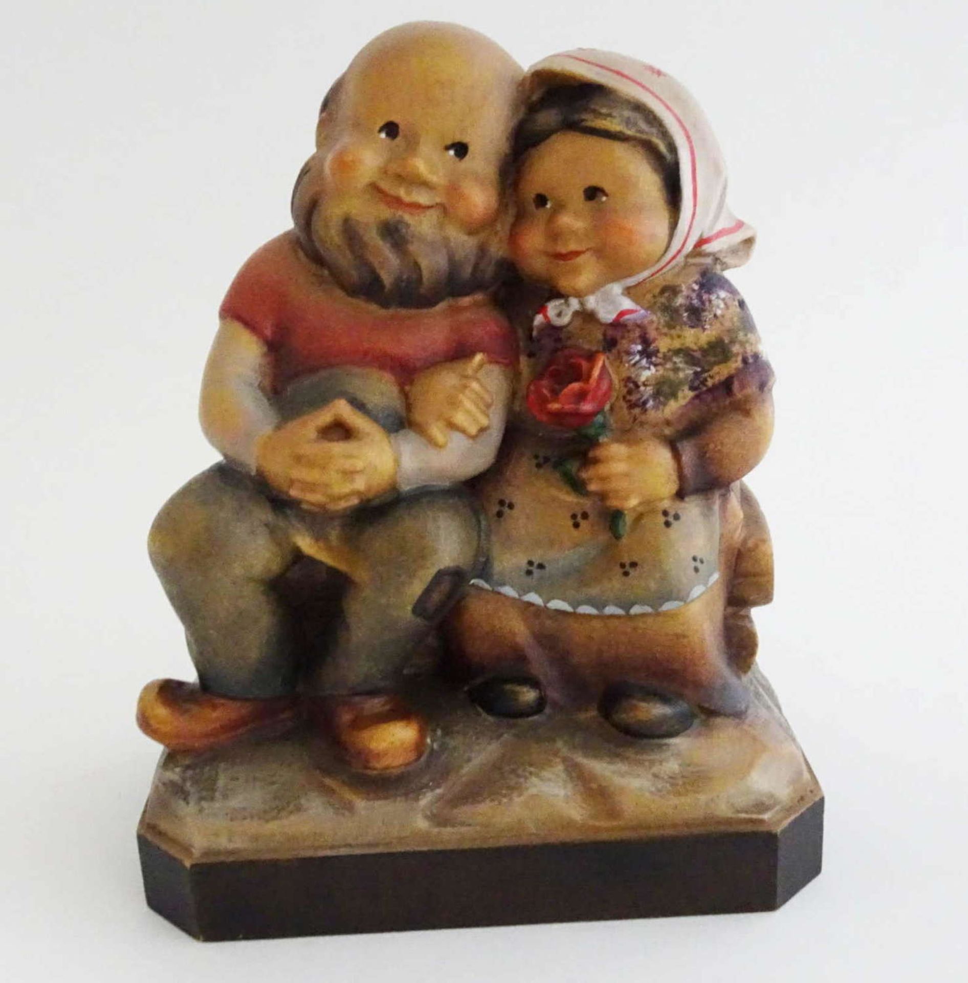 Toni Baur, wood carver from Oberammergau, old couple, sitting on a bench. Length about 10.5 cm,