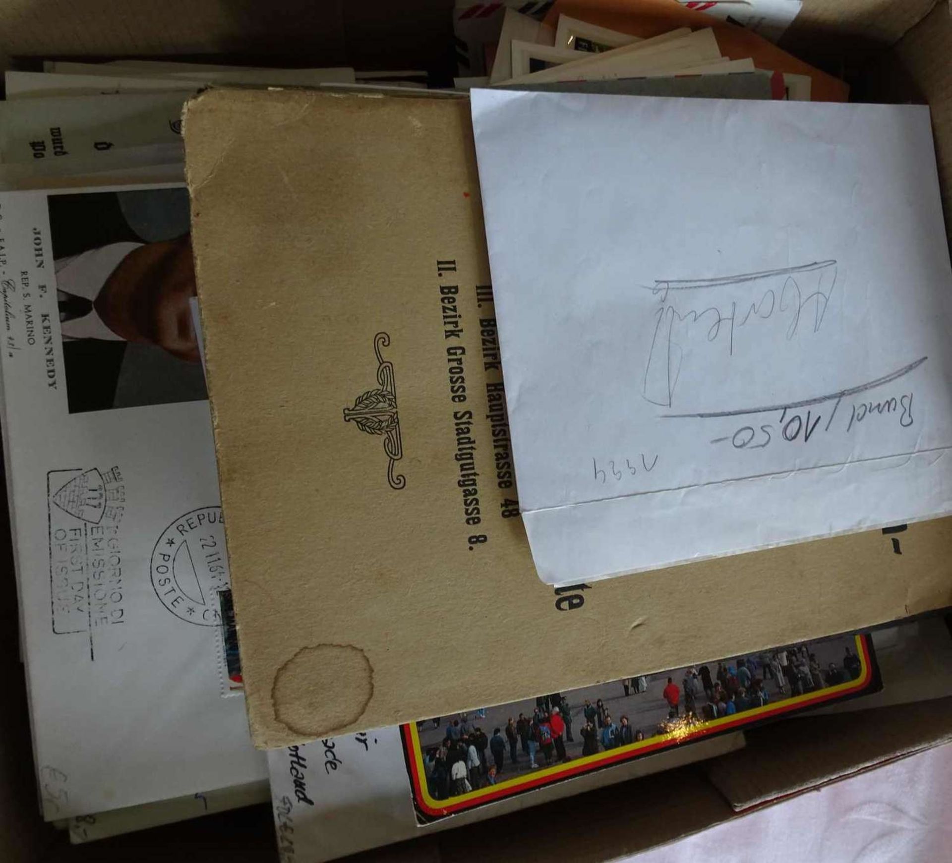 Small cardboard box full of philately remains, along with nice documents and cards. Please visit!