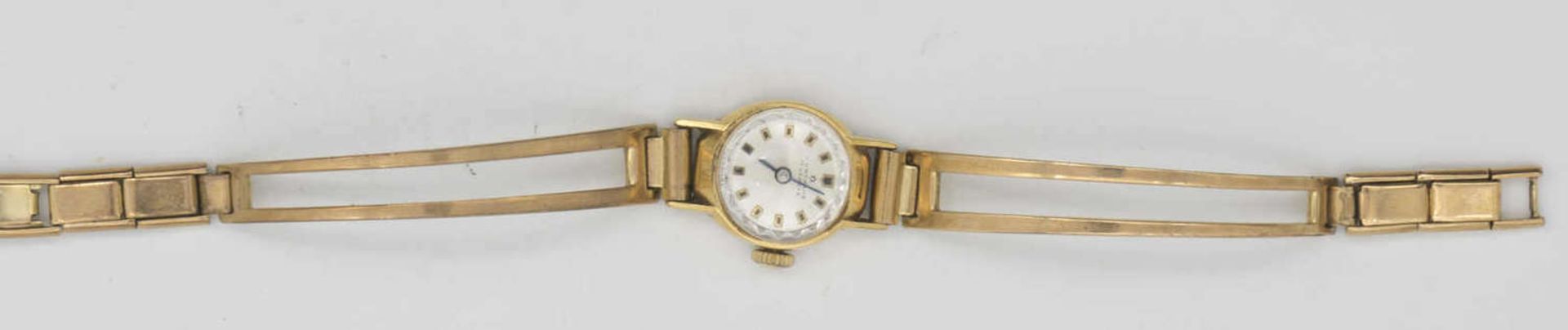 Junghans Damen - Armbanduhr, vergoldet, 17 Juwels. Handaufzug. Die Uhr läuft an.Junghans Damen -