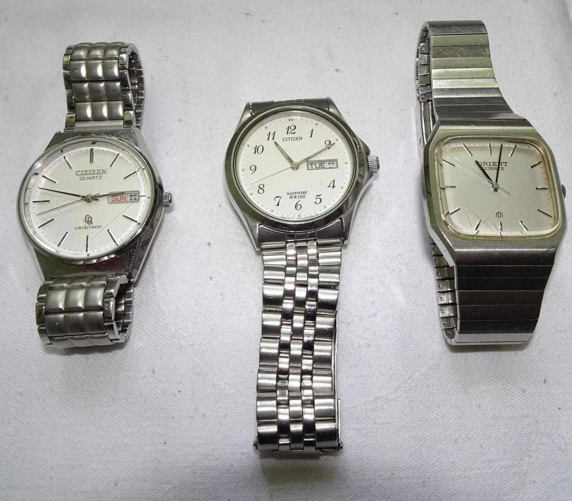 3 Citizen men's wristwatches, different models. All quartz. Worn, good condition.3 Citizen