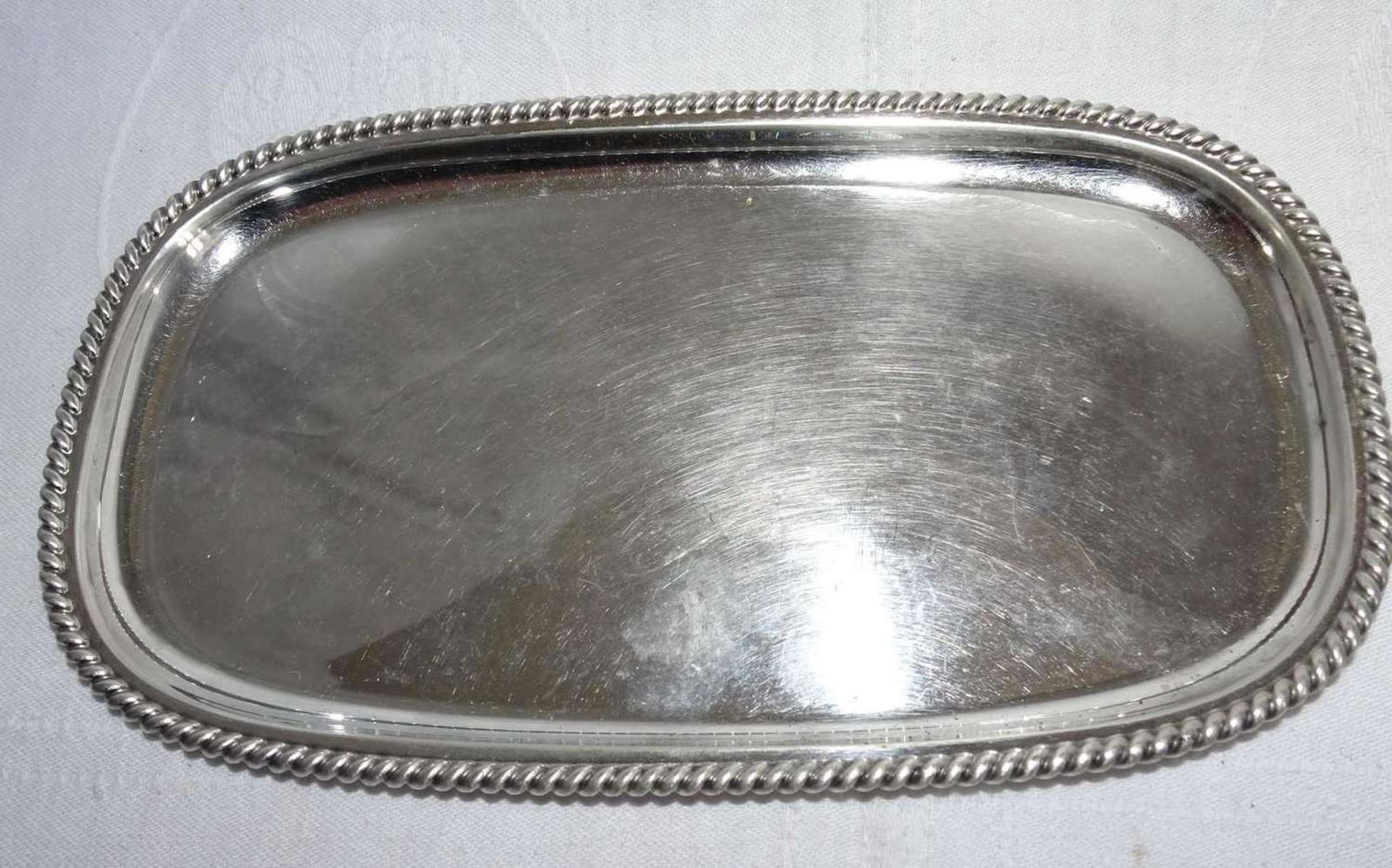 Small silver tray by Wilkens, cord edge. Hallmarked Wilkens, 835, model no. 8040. Dimensions: length