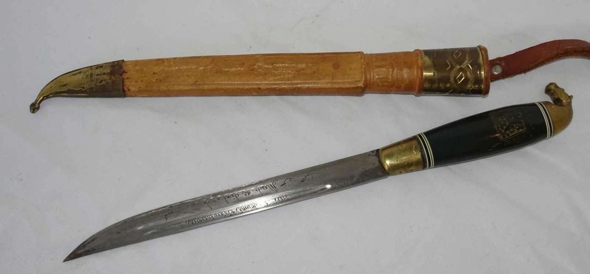 Kauhava Finland, hunting dagger in original leather edge. Engraved by the manufacturer. Length about