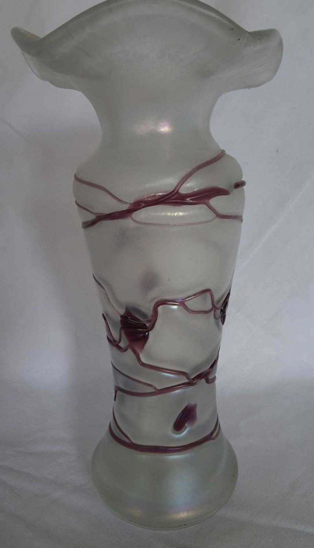 Glass vase in Art Nouveau style, probably Bohemia, with purple thread melts. Good condition.