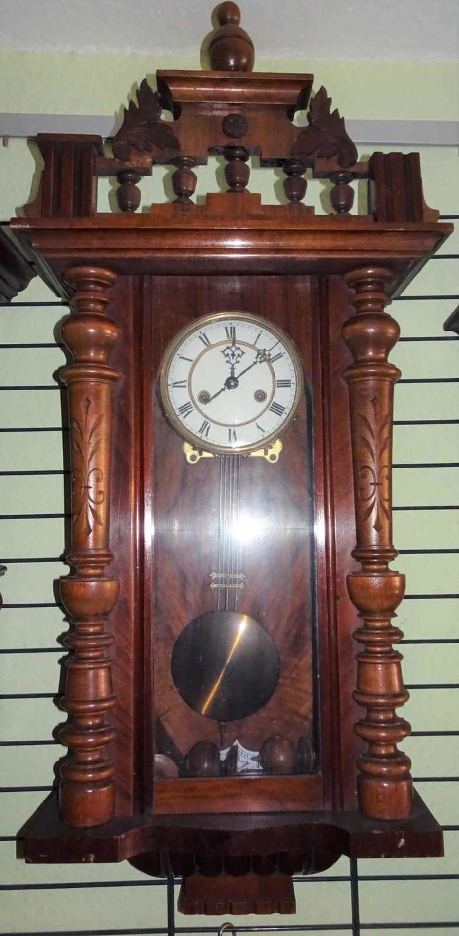 Wilhelminian style wall clock, good condition, dimensions approx. 89 x 40 x 19 cm.Gründerzeit